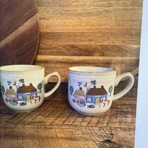 Charming Village Scene Ceramic Mugs